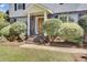 Classic front entrance with brick steps, dark railings and a warm wooden door at 649 Pawley Rd, Mount Pleasant, SC 29464