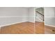 Living room with hardwood floors and neutral walls, offering a clean and versatile space at 649 Pawley Rd, Mount Pleasant, SC 29464