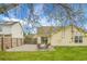 Spacious backyard with a patio, fire pit, and seating, perfect for outdoor entertaining at 7120 Sweetgrass Blvd, Hanahan, SC 29410