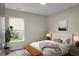 Bright bedroom featuring a cozy queen bed, neutral tones, and a view to the green outdoors at 7120 Sweetgrass Blvd, Hanahan, SC 29410