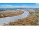 Gorgeous aerial view of a waterway with private docks extending into the river at 7803 Park Gate Dr, Charleston, SC 29418
