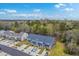 Community aerial view highlighting the new townhomes nestled amongst lush greenery and landscaping at 7803 Park Gate Dr, Charleston, SC 29418