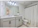 This bathroom features a modern vanity and shower with tub at 7803 Park Gate Dr, Charleston, SC 29418