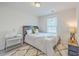 Bedroom features a neutral color scheme and natural light at 7803 Park Gate Dr, Charleston, SC 29418