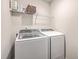 Well-lit laundry room with washer and dryer at 7803 Park Gate Dr, Charleston, SC 29418