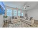 Spacious living room with ample seating and bright natural light at 7803 Park Gate Dr, Charleston, SC 29418