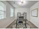 Bright office with a large window, modern desk, and plenty of shelving for storage at 7803 Park Gate Dr, Charleston, SC 29418