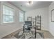 Bright office space with large window, modern desk setup, and stylish decor at 7803 Park Gate Dr, Charleston, SC 29418