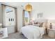 Bright bedroom with modern lighting, white walls, and plenty of natural light at 790 Clay Field Trl, Summerville, SC 29485