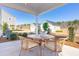 Covered patio featuring a charming round table and chairs, perfect for outdoor entertaining at 790 Clay Field Trl, Summerville, SC 29485