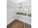 Organized pantry with labeled storage containers and wire shelving at 792 Clay Field Trl, Summerville, SC 29485
