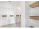 Spacious walk-in closet with wire shelving and decorative baskets at 792 Clay Field Trl, Summerville, SC 29485