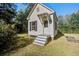 Charming guest house with a clean design, natural surroundings, and welcoming entrance at 8115 Adams Run School Rd, Adams Run, SC 29426