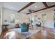 Inviting living room with hardwood floors, comfortable seating, and bright, airy lighting at 8115 Adams Run School Rd, Adams Run, SC 29426