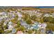 Overhead neighborhood shot features an expansive community with homes nestled among the trees with river views at 873 Tupelo Bay Dr, Mount Pleasant, SC 29464