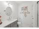 Bright bathroom features white walls, gray vanity, and stylish decor throughout the space at 873 Tupelo Bay Dr, Mount Pleasant, SC 29464