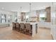 Spacious kitchen island with breakfast bar and modern countertops, stylish lighting and stainless appliances at 873 Tupelo Bay Dr, Mount Pleasant, SC 29464
