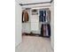 Well-organized walk-in closet with ample storage and a sliding barn door entrance at 873 Tupelo Bay Dr, Mount Pleasant, SC 29464