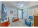 Comfortable bedroom with a ceiling fan and chair by a window, offers a cozy and inviting retreat at 891 Wynford Ct, Mount Pleasant, SC 29464