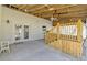 Inviting covered patio featuring an elevated deck area and french doors at 9861 Levenshall Dr, Ladson, SC 29456