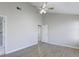 Airy bedroom with a fan, light wood floors, and access to a modern bathroom at 9861 Levenshall Dr, Ladson, SC 29456