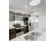 Modern kitchen with stainless steel appliances and granite countertops at 9861 Levenshall Dr, Ladson, SC 29456