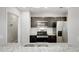 Modern kitchen with stainless steel appliances, granite countertops, and tile backsplash at 9861 Levenshall Dr, Ladson, SC 29456