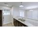 Modern kitchen with granite countertops and stainless steel appliances at 9861 Levenshall Dr, Ladson, SC 29456