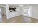 Bright and airy dining room with access to the patio, adjoined to the kitchen with granite countertops at 9861 Levenshall Dr, Ladson, SC 29456
