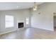 Inviting living room features a fireplace, hardwood floors, and plenty of natural light at 9861 Levenshall Dr, Ladson, SC 29456