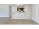 View of dining room with access to kitchen with granite countertops and stainless steel appliances at 9861 Levenshall Dr, Ladson, SC 29456