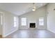Bright and spacious living room features a fireplace, vaulted ceiling, and lots of natural light at 9861 Levenshall Dr, Ladson, SC 29456