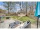Relaxing backyard with a patio, shed, seating area, and a well-maintained lawn at 101 Plantation Dr, Summerville, SC 29485