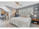 Spacious bedroom with gray walls, ceiling fan, a bed, and natural light from windows at 101 Plantation Dr, Summerville, SC 29485