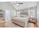 Bright bedroom with vaulted ceilings, neutral decor, and an ensuite bathroom, offering a serene retreat at 101 Plantation Dr, Summerville, SC 29485