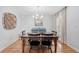 Inviting dining room featuring a wooden table, stylish chandelier, and neutral decor for Gathering meals at 101 Plantation Dr, Summerville, SC 29485
