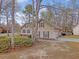 View of the house with a large yard and a driveway, showcasing its curb appeal at 101 Plantation Dr, Summerville, SC 29485