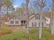 Charming home with well-maintained landscaping, inviting curb appeal, and traditional architectural details at 101 Plantation Dr, Summerville, SC 29485