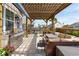 Backyard patio with outdoor kitchen, grill, dining area, and comfortable seating at 109 Airy Dr, Summerville, SC 29486