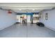 Spacious two car garage with epoxy floor, cabinets, and overhead lighting at 109 Airy Dr, Summerville, SC 29486