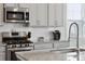 Well-equipped kitchen with stainless steel appliances, modern backsplash, and granite countertops at 109 Airy Dr, Summerville, SC 29486