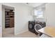 Practical laundry room featuring modern washer/dryer set, built-in cabinet, and adjacent walk-in closet at 109 Airy Dr, Summerville, SC 29486