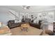 Open-concept living room with hardwood floors, comfortable seating, and neutral decor at 109 Airy Dr, Summerville, SC 29486