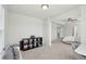 Spacious main bedroom with a sitting area, neutral tones, and ample natural light at 109 Airy Dr, Summerville, SC 29486