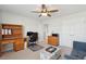 Spacious office boasts a ceiling fan, ample desk space, and storage solutions for organized productivity at 109 Airy Dr, Summerville, SC 29486