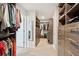 Large walk-in closet with custom organization system, carpet, and ample storage space at 109 Airy Dr, Summerville, SC 29486