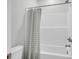 Tub-shower combination featuring a stylish shower curtain and brushed nickel fixtures at 110 Brown Swiss Cir, Summerville, SC 29483