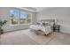 Bright bedroom with a large window, comfortable bed, and neutral decor creating a serene atmosphere at 110 Brown Swiss Cir, Summerville, SC 29483