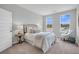 Comfortable bedroom with large windows, carpet, and stylish furnishings at 110 Brown Swiss Cir, Summerville, SC 29483