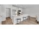 Spacious kitchen island with a quartz countertop and seating, perfect for entertaining at 110 Brown Swiss Cir, Summerville, SC 29483